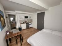 Kuchnia lub aneks kuchenny w obiekcie Pied à terre tout confort