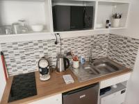 Kuchnia lub aneks kuchenny w obiekcie Pied à terre tout confort