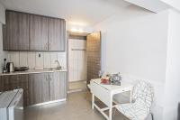 Kuchyň nebo kuchyňský kout v ubytování Ayia Napa Holiday Apartment Ss1
