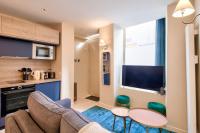 Kuchyňa alebo kuchynka v ubytovaní Cozy apartement heart historic Paris