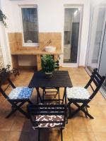 Posezení v ubytování Patio Port Serrallo