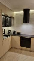 Kuchyňa alebo kuchynka v ubytovaní Apartament Bulwary Oświęcim