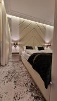 Posteľ alebo postele v izbe v ubytovaní Apartament Bulwary Oświęcim