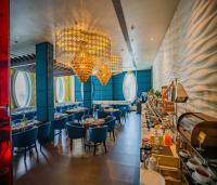 Khu vực ghế ngồi tại Barsana Hotel & Resort Siliguri