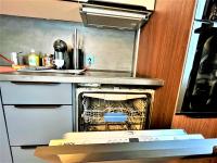 Kuchyň nebo kuchyňský kout v ubytování Bravo 5 Holiday Home