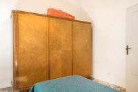 A bed or beds in a room at M224 - Marcelli, trilocale con giardino a 150mt dal mare