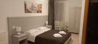 a bedroom with a bed with two towels on it at Palazzetto Canossa in Venice