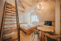Postel nebo postele na pokoji v ubytování Apartman s výhledem