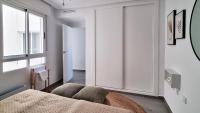 A seating area at Apartamento Torre Buena Vista