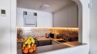 A kitchen or kitchenette at Apartamento Torre Buena Vista