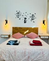 Posteľ alebo postele v izbe v ubytovaní Coqueto apartamento céntrico con piscina