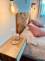 Posteľ alebo postele v izbe v ubytovaní Coqueto apartamento céntrico con piscina
