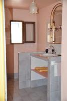 a bathroom with a sink and a mirror at Bastide la Fondue in Allemagne-en-Provence