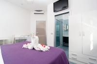 Guest House Emily Suites Sorrentoにあるベッド