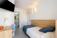 Posteľ alebo postele v izbe v ubytovaní Hotel Vibra Marítimo