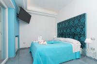 Guest House Emily Suites Sorrentoにあるベッド