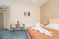 Guest House Emily Suites Sorrentoにあるベッド