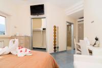Guest House Emily Suites Sorrentoにあるベッド
