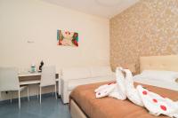 Guest House Emily Suites Sorrentoにあるベッド