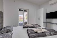 Posteľ alebo postele v izbe v ubytovaní Crikvenica Apartment 18