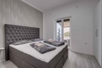 Posteľ alebo postele v izbe v ubytovaní Crikvenica Apartment 18
