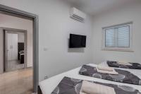Posteľ alebo postele v izbe v ubytovaní Crikvenica Apartment 18