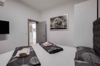 Posteľ alebo postele v izbe v ubytovaní Crikvenica Apartment 18