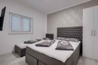 Posteľ alebo postele v izbe v ubytovaní Crikvenica Apartment 18