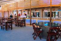 Un restaurant u otro lugar para comer en Hotel Pousada Mahon Mar