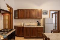 A kitchen or kitchenette at Gracie's Getaway x6