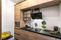 Kuchyňa alebo kuchynka v ubytovaní Rent like home - Ubocz 1D