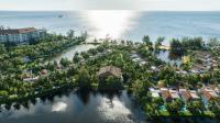 an aerial view of a resort on the water at Vinpearl Resort & Spa Phu Quoc in Phú Quốc