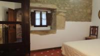 Postel nebo postele na pokoji v ubytování La Bodega de Casona de Linares