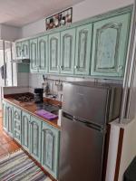 Kuchyň nebo kuchyňský kout v ubytování MARODY HOUSE ATICO B