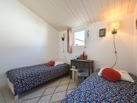 Posteľ alebo postele v izbe v ubytovaní Maison Familiale Calme avec Jardin et Terrasse Plein Sud - Les Portes-en-Ré - FR-1-434-103