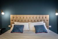 A bed or beds in a room at Hs4U Ricasoli Luxury apartment near Duomo N.2