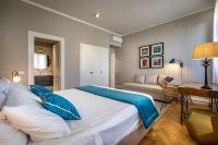 A bed or beds in a room at Hs4U Ricasoli Luxury apartment near Duomo N.2