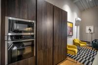 A kitchen or kitchenette at Hs4U Ricasoli Luxury apartment near Duomo N.2