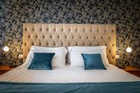 A bed or beds in a room at Hs4U Ricasoli Luxury apartment near Duomo N.2