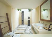 a bathroom with a sink and a mirror at Qunci Villas Resort in Senggigi