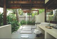 a bathroom with a sink and a counter with sidx sidx sidx at Qunci Villas Resort in Senggigi