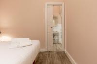 A bed or beds in a room at Fiesolana Elegant