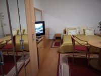Televízia a/alebo spoločenská miestnosť v ubytovaní BALATON ART Guesthouse