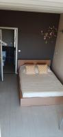 a bedroom with a large bed with at Vaste appartement avec vue sur la Vienne in Chinon
