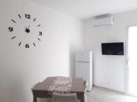 Televízia a/alebo spoločenská miestnosť v ubytovaní Casa vacanze Bia Blu