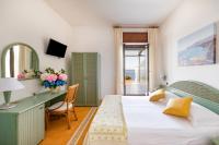 Posteľ alebo postele v izbe v ubytovaní Hotel Sporting