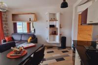 Kuchyňa alebo kuchynka v ubytovaní Magnifique appartement avec balcon vue mer à l'entrée d'Ajaccio