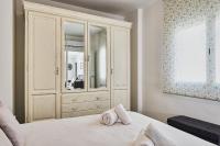 Posteľ alebo postele v izbe v ubytovaní Capitán - Apartamento en el autentico centro de Málaga