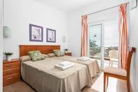 Postel nebo postele na pokoji v ubytování Villas Calan Bosch Olivia