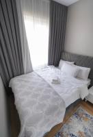Postel nebo postele na pokoji v ubytování King Suite TH28